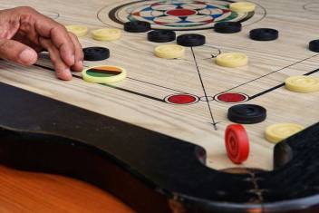 Carrom Board: A Game of Skill, Precision, and Strategy